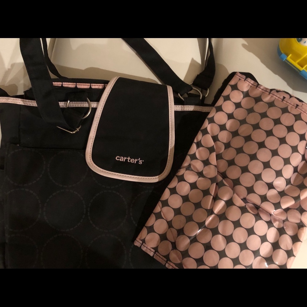 Brand new carter’s diaper bag with changing pad